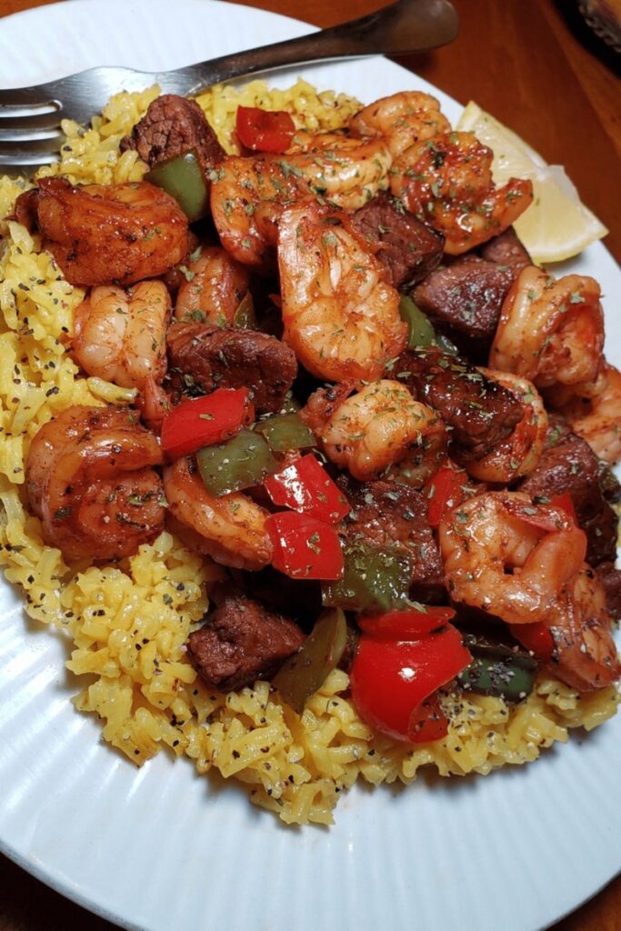 Jerk Steak & Shrimp over Yellow Rice